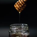 brown wooden honey dipper